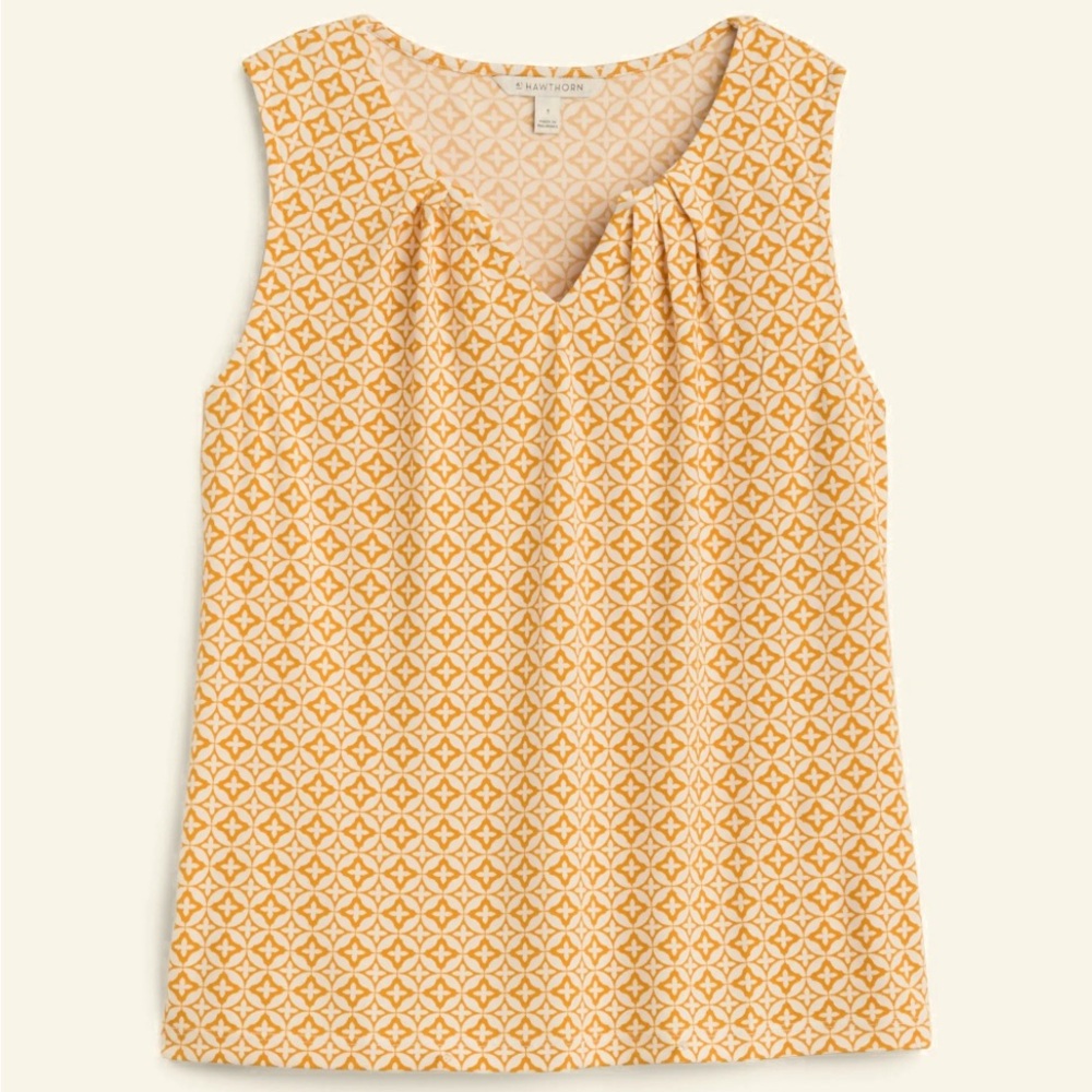 Lightweight sleeveless blouse.   Wear layered or alone!